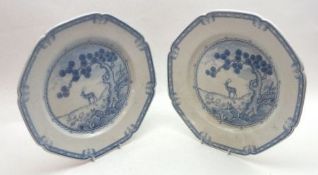 A pair of Royal Doulton Kang-he Octagonal Plates, printed in blue with central panel of deer, 9 ½”