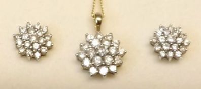 An all brilliant Diamond set of circular flower head Pendant and pair of matching stud Earrings, the
