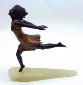 A Patinated Bronze Figure of a young girl running, raised on a polished marble spear-shaped base,