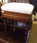 A Victorian Rosewood Adjustable Rectangular Piano Stool with upholstered top, raised on four