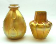 Two Tiffany Glass Favrille Vases, one ribbed and unmarked example of shaped oval form, the other