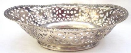 A late 19th/early 20th Century small Electroplated Table Basket of lobed oval form, trellis and