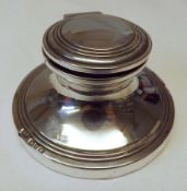 A small George V Capstan Inkwell of usual form, loaded base, hinged lid (no liner), 2 ½” diameter,