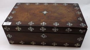 A late 19th Century Mahogany and Rosewood Writing Box inlaid with mother-of-pearl detail, interior
