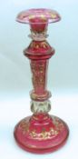 A Decorative Bohemian or Venetian Glass Candlestick, gilded with bellflowers throughout, and with