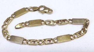 A hallmarked 9ct Gold Curved and Rectangular Link Bracelet (catch defective), 21cm long and weighing