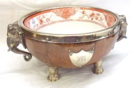 An interesting late Victorian Oak Salad Bowl with partially silver plated mounts, elephant handles