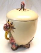 A Clarice Cliff “My Garden” Circular Biscuit Barrel of tapering form with wicker looped handle,