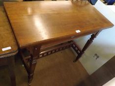 A late Victorian American Walnut Card Table, the folding and swivelling top fitted with green