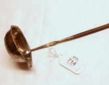 A Georgian period Punch Ladle, the oval bowl with fan and bead embossing, punched rim (with tears)