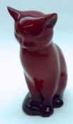 A Royal Doulton Flambé Model of a seated cat, 5” high