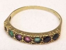 A hallmarked 9ct Gold seven gemstone Ring, spelling the word “D E A R E S T”