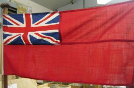 A Vintage Red Ensign Flag, approx. size 13” x 27” tied to wooden Flag Pole, approx height 34”