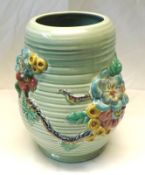 A Clarice Cliff Large Ribbed Baluster Vase, relief moulded with a coloured floral design, green