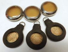 A packet containing three Metal and three Rubber Pocket Watch Protectors, (6)