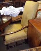 A 19th Century Gainsborough style Oak and Elm Framed Armchair, the back and seat upholstered in a