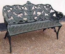 An Ornate Cast Iron Coalbrookdale style Garden Bench, the back moulded with fern leaf design to a