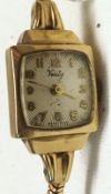 A Ladies 1950s 9ct Gold Cased Verity Wristwatch with gold Arabic numbers to a silvered dial,