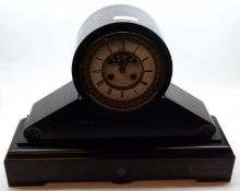 A late 19th Century Large Black Marble Mantel Clock, circular face with white enamelled dial and