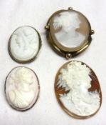 A Mixed Lot: two small Hardstone Cameo Brooches of classical ladies, a larger Pinchbeck framed Shell