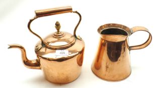 A Copper Kettle of typical form; together with a Copper Jug with looped handle, the largest piece