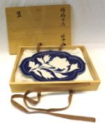 A Japanese Blue and White Studio Porcelain Dish, decorated with a single peony bloom, in original