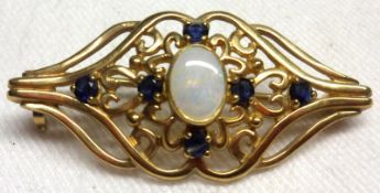 A hallmarked 9ct Gold Openwork Bar Brooch in Victorian style, the latticework centre set with a