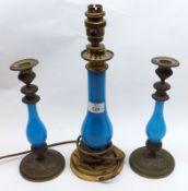 A pair of Brass blue glass Candlesticks, 9 ½” high; together with a further similar electric Table