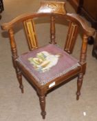 An Edwardian Mahogany and Line Inlaid Child’s Corner Chair, with tapestry upholstered seat, raised