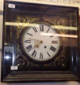 A French Ebonised Cased Vineyard type Wall Clock of square form, the face inlaid with cut Brass