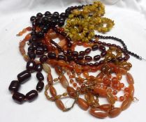 A Mixed Lot: Amber Bead Necklace, Cornelian and other Bead Necklaces (qty)
