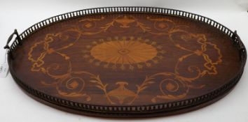 An oval Mahogany and inlaid Serving Tray, decorated in the Adams Revival style, with a brass