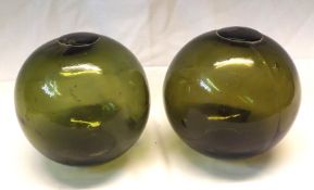 A pair of Vintage green Glass Fishing Floats of spherical form, 5” diam approx