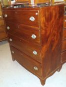 A 19th Century Mahogany Chest of four full length drawers, oval brass plate handles, raised on small