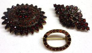 A group of three Victorian Multi-Garnet Set metal-backed Brooches (3)