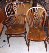 A set of eight late 19th Century Windsor style Stick Back Chairs, the hooped backs with central