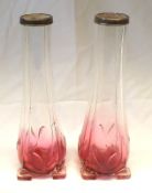 A pair of Cranberry Tinted Glass Spill Vases, each applied with hallmarked silver rims, circa