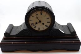A large Victorian black Marble Mantel Clock, circular face with black enamelled Roman chapter