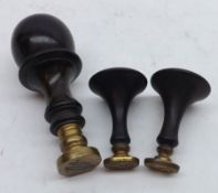 A Mixed Lot: three Treen-handled and Brass Table Seals, largest piece 4” long