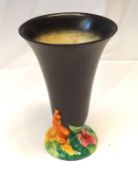 A Clarice Cliff “My Garden” Trumpet Vase, plain black body and coloured relief moulded floral