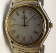 A Gents circa 1980s Ebel stainless steel cased Wristwatch with 18K gold bezel, gold Roman numerals