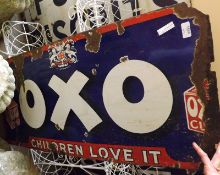 A Vintage Oxo Enamel Sign, with white lettering on a blue and red background, 44” long (heavily
