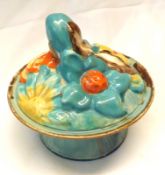 A Clarice Cliff “My Garden” Covered Circular Pot, with relief moulded lid and green glaze body, blue