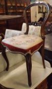 A single Victorian Rosewood Balloon Back Dining Chair, the seat with floral tapestry cover, raised