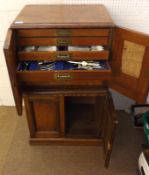 A Victorian Walnut Cabinet Canteen, the top with two doors opening to reveal six drawers within,