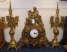 A Cast Brass Garniture comprising a central Clock crested with group of a couple in period