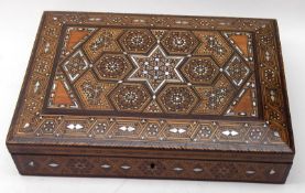 A Middle Eastern Marquetry Inlaid Rectangular Box, the top decorated with geometric designs with