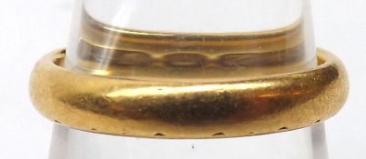 A plain hallmarked 22ct Gold Wedding Ring, weighing approx 4 ½ gm