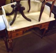 A Victorian Wash Stand, the cream marble galleried top to a satinwood base, fitted with two long and