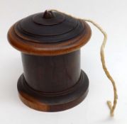 A Hardwood (possibly Lignum Vitae) Turned Round String Dispenser, 3 ½” high